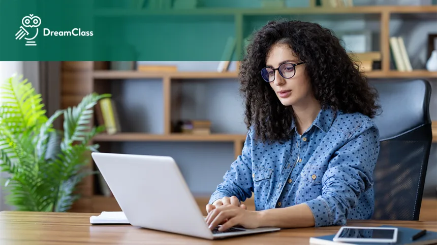 Image of a teacher using DreamClass, when their growing school outgrows spreadsheets