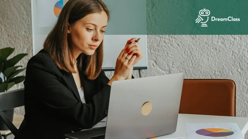 Image of a teacher using DreamClass, when their growing school outgrows spreadsheets